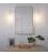Fermaluce Metal, metal wall light with bent extension
