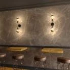 Fermaluce Metal, metal wall light with double bent extension