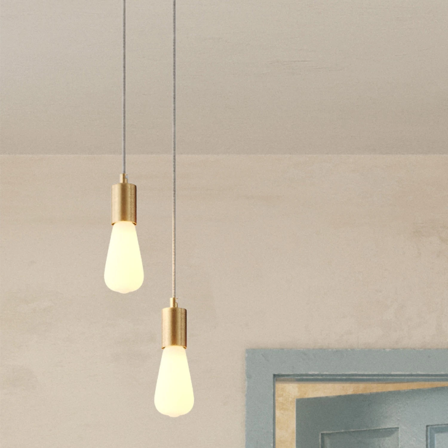 2-light multi-pendant lamp featuring fabric cable and metal finishes