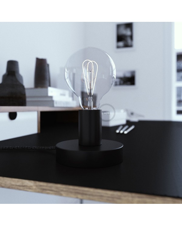 Posaluce, the black metal table lamp, with textile cable, in-line switch and english plug