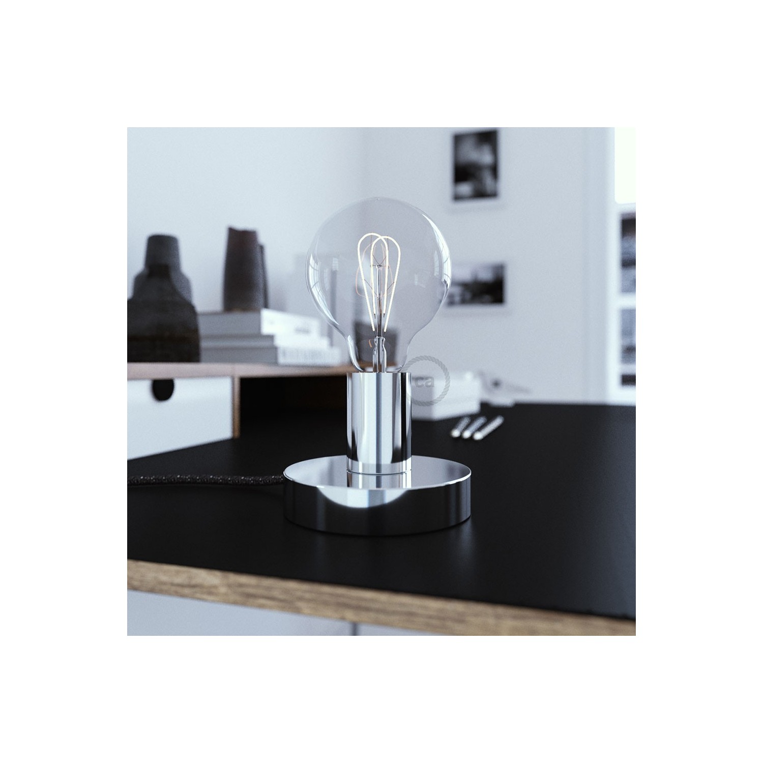 Posaluce, the chrome metal table lamp, with textile cable, in-line switch and english plug