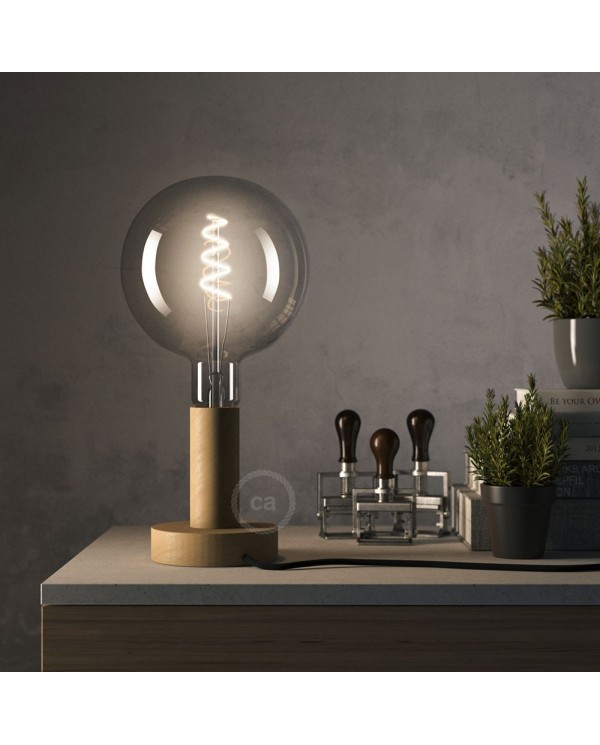 Posaluce Natural, the 14,2 cm natural wood table lamp, with textile cable, in-line switch and english plug