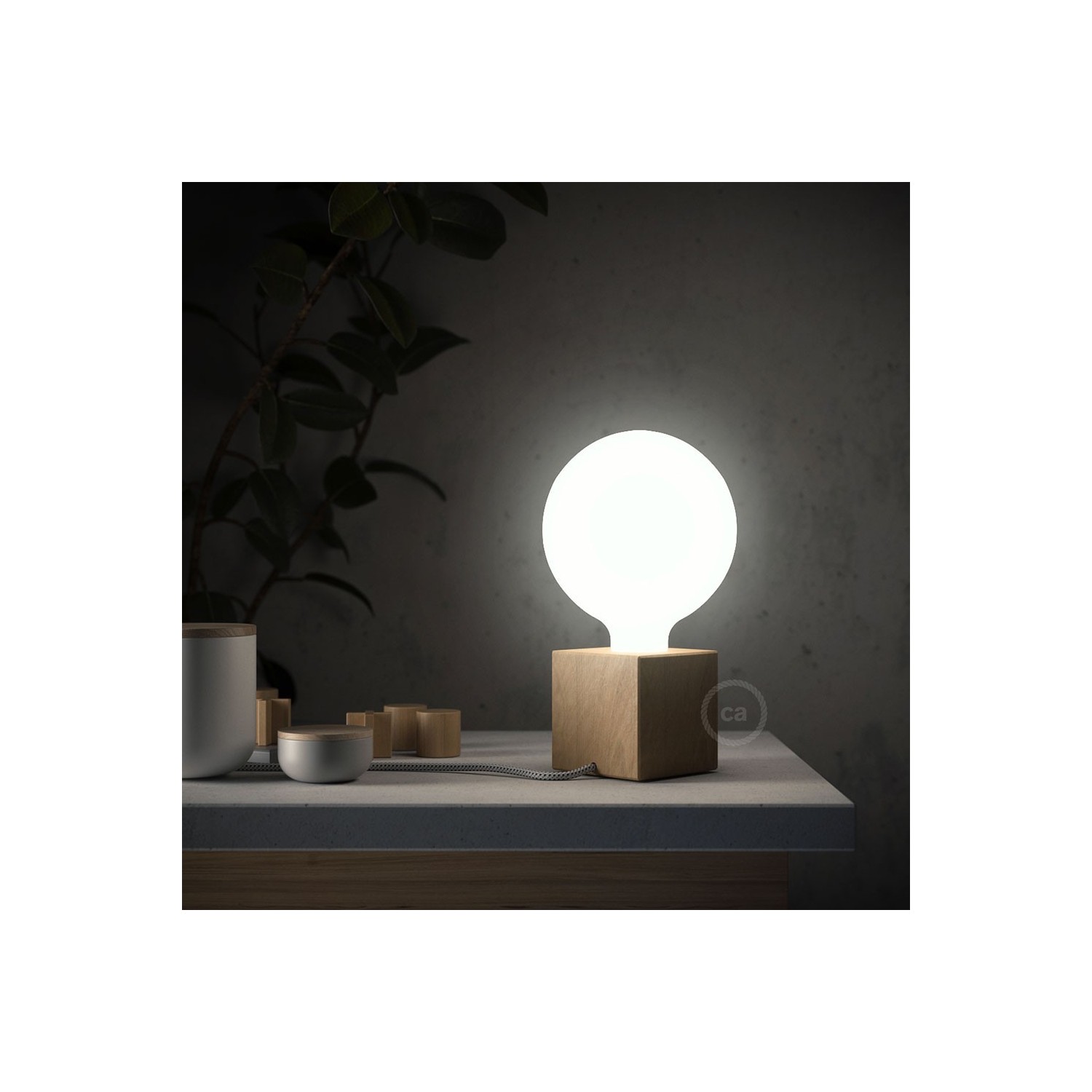 Posaluce Cubetto, the natural wood table lamp, with textile cable, in-line switch and english plug