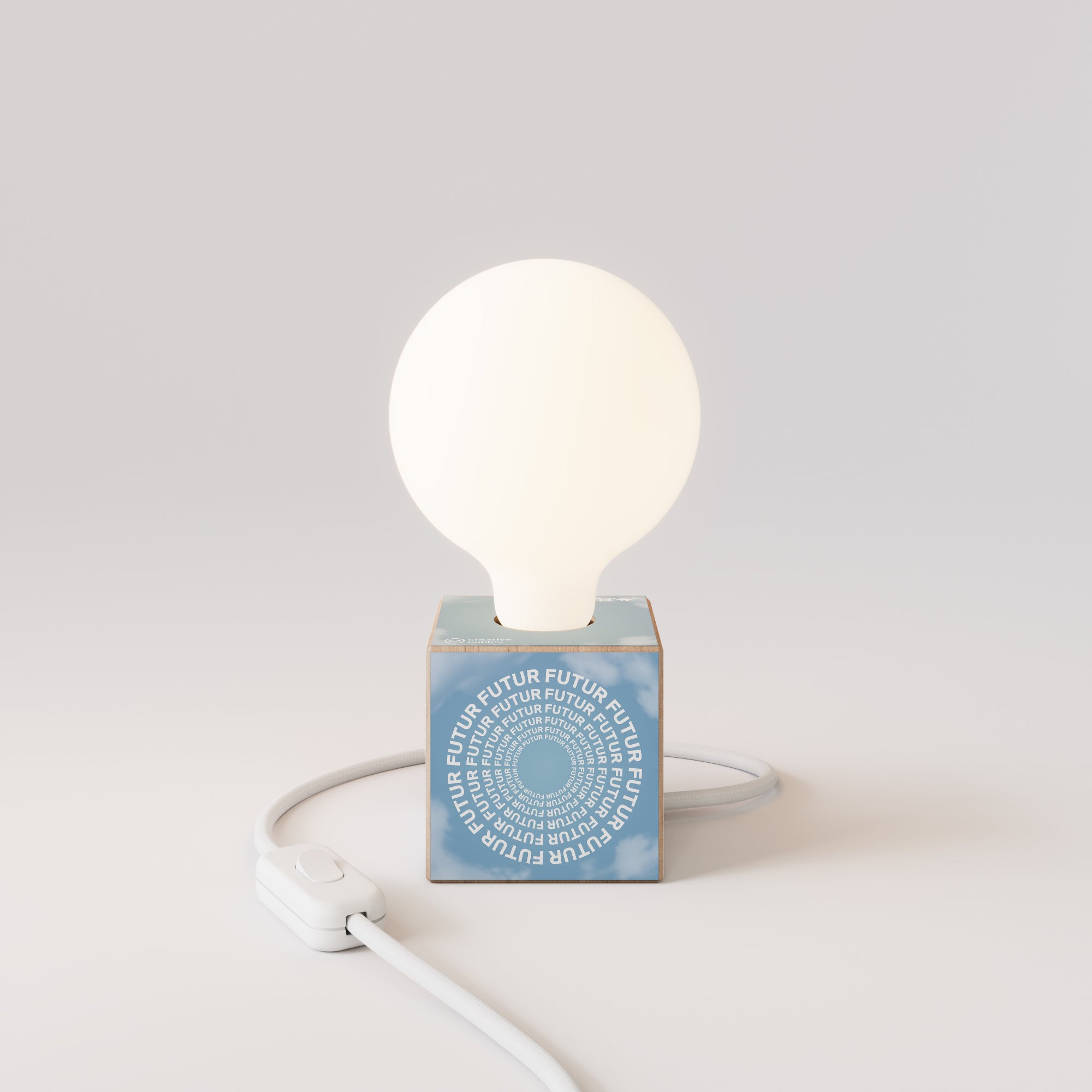 Cubetto table lamp "Futur" with English Plug and porcelain-effect globe Light bulb - Futur festival